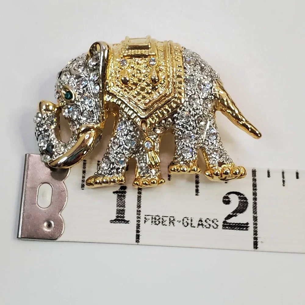Figural Gold Tone Metal & Rhinestone Encrusted Trunk-up Elephant Brooch Pin